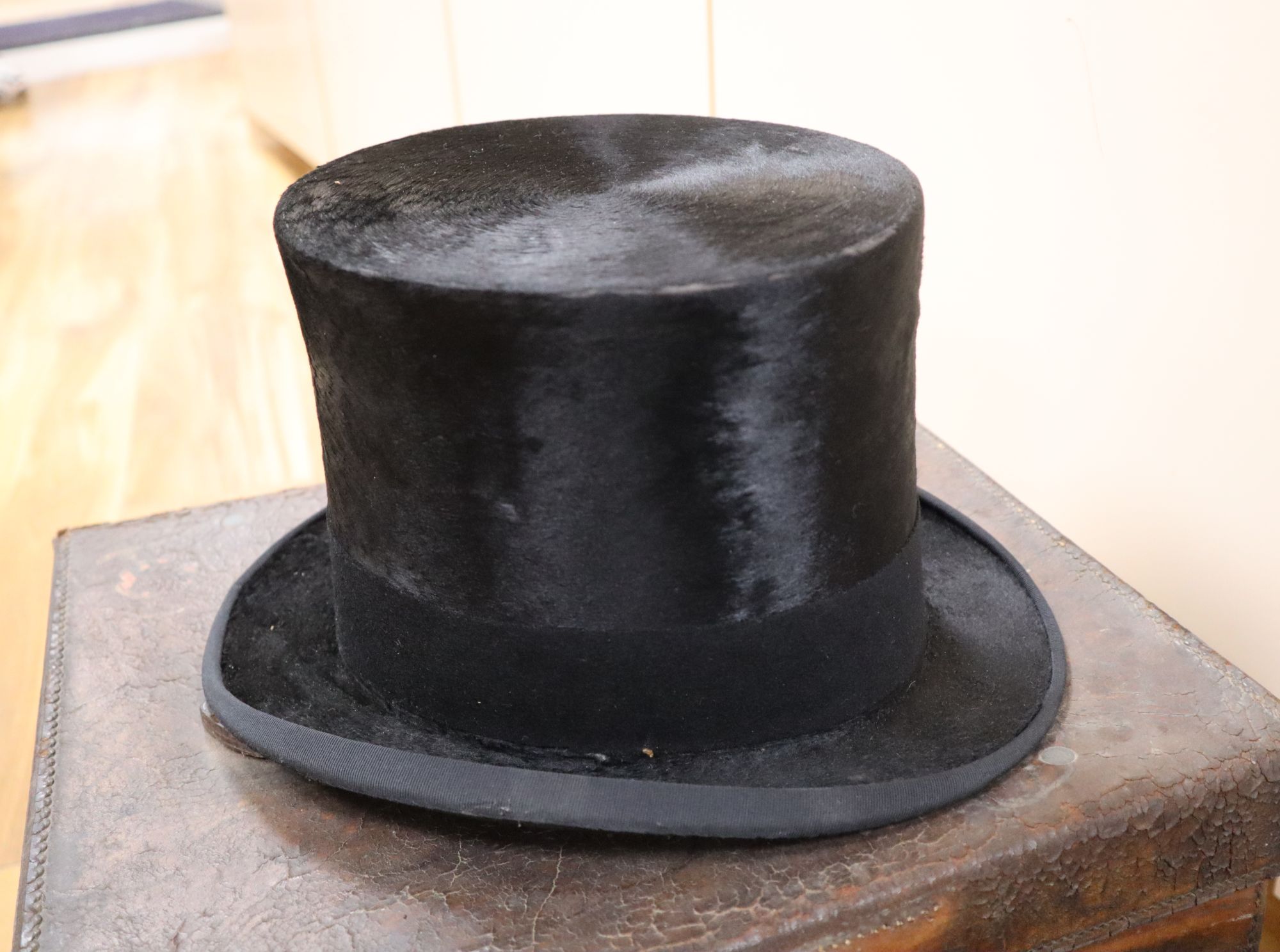 Two Victorian Locke & Co silk top hats and two felt top hats